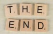 close up of scrabble tiles forming the words the end
